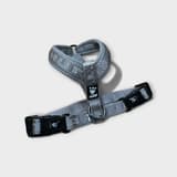 Close-up of a used red Hurtta Casual dog harness, 30-35 cm, reflective details