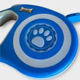 Detail image of Zoofari retractable leash showing the handle and extended nylon leash.