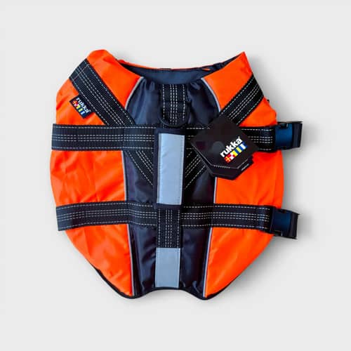Rukka Safety Life Vest för hund, svart och orange, med reflexer.