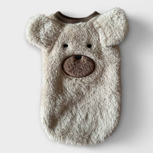 Mjuk teddybjörnsansikte på hundtröja i fleecematerial, beige.