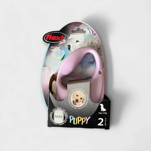 Detalj av Flexi Puppy rullkoppel förval, fokus på ergonomiskt handtag