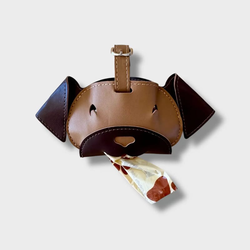 Brown Kobe Poo Bag Holder attached to dog leash, close-up.