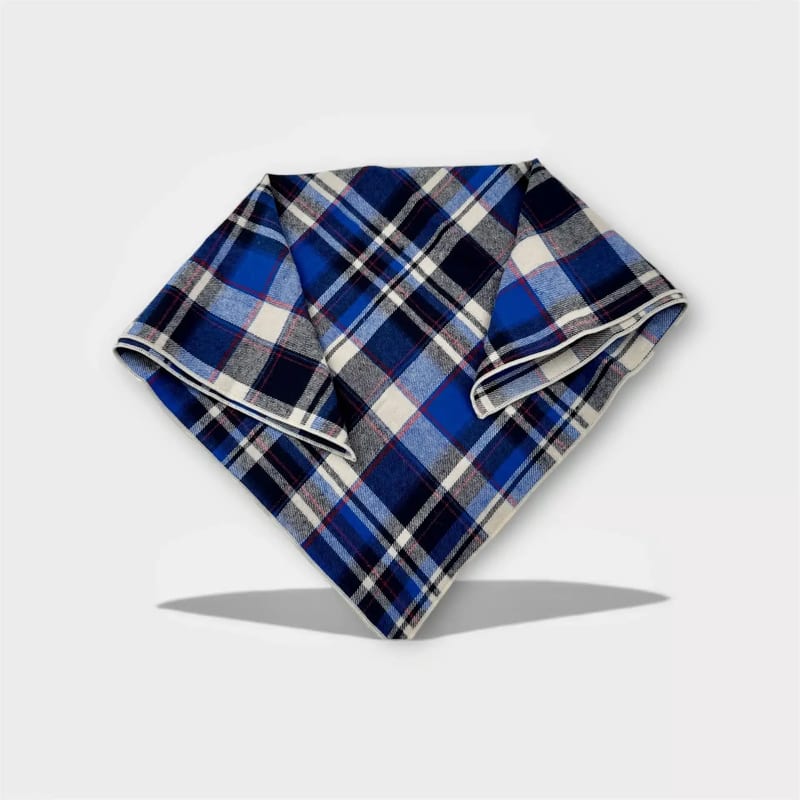 Second-hand dog bandana with Nordic plaid pattern in white and brown, shown flat.