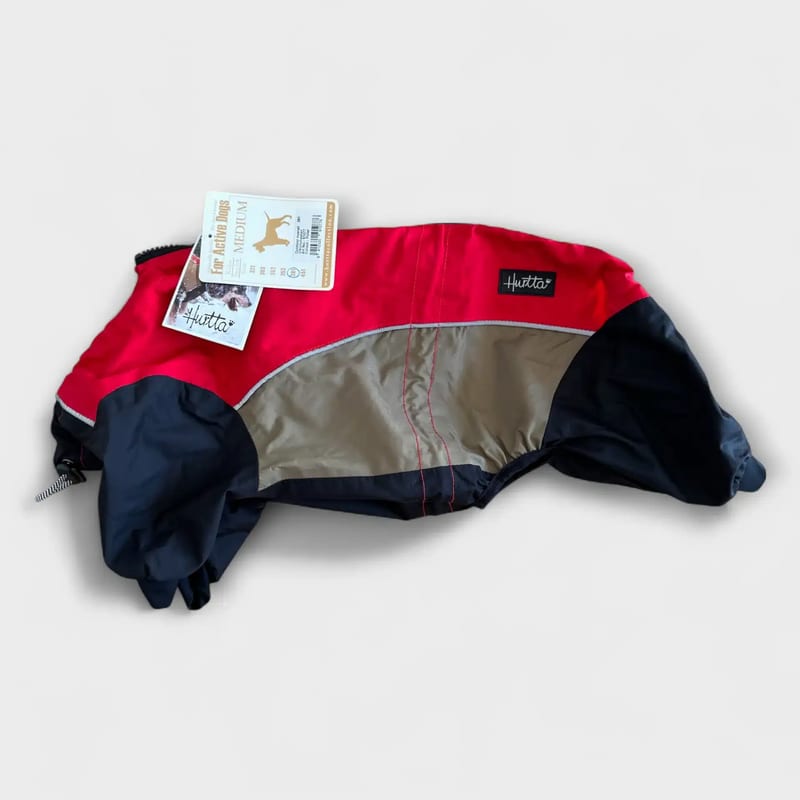 Used Hurtta dog overall in red and black, ideal for rainy weather.
